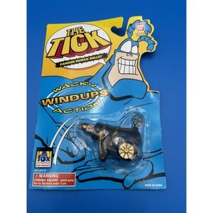 Retro 90s The Tick "Cannon Human Bullet" Wacky Wind Up Bandai Action Figure Toy